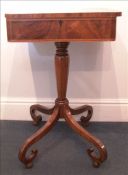 A 19th century marquetry inlaid rosewood work table The geometrically inlaid hinged top enclosing