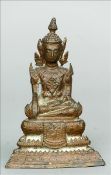 An 18th/19th century Siamese patinated bronze model of Buddha Modelled seated in the lotus