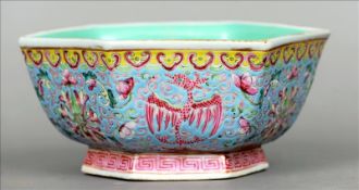 A 19th century Chinese hexagonal enamel decorated bowl The exterior blue ground decorated with