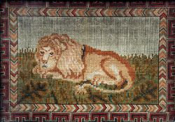 A pair of early 19th century needlework pictures Depicting a lion and a tiger within geometric