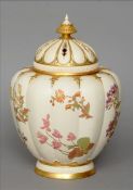 A 19th century large Royal Worcester pot pourri pot and cover The lobed baluster body gilt and