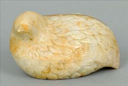 A Chinese carved soapstone box and cover Naturalistically modelled as a quail. 7 cms high. Generally