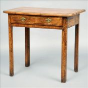 An 18th century walnut side table The line inlaid and crossbanded moulded top above a single line