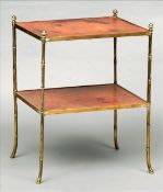 A mid 20th century leather topped brass framed two tier etergere The rectangular tooled leather