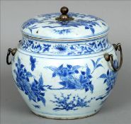 A 17th century Chinese transitional blue and white porcelain white metal mounted storage jar and