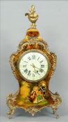 A late 19th century French gilt metal mounted painted bracket clock The vase finial mounted domed