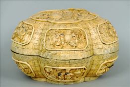 A Chinese carved bone box Of lobed shape with vignettes of children in various pursuits, the