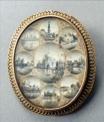 A Victorian unmarked gold mounted ivory brooch The central oval ivory panel painted with vignettes