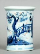 A Chinese porcelain blue and white brush pot The flared cylindrical body decorated with variously