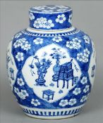 A 19th century Chinese blue and white ginger jar The main ground and lid with prunus blossom