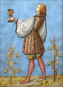 A 19th century needlework picture Depicting a figure holding a chalice, housed in a gilt decorated