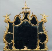 An 18th century carved giltwood chinoiserie mirror, in the manner of Thomas Chippendale The ornately