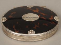 A 19th century unmarked white metal mounted tortoiseshell snuff box The domed hinged lid with an