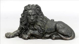 A 19th century cast iron heath ornament Modelled as a recumbent lion, the reverse with a scroll cast