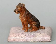 An early 20th century cold painted bronze model Formed as a terrier, mounted on a domed shagreen