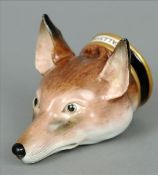 A 19th century English porcelain stirrup cup Naturalistically modelled and painted as a fox’s