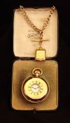 A gold plated half hunter pocket watch Together with an Albert chain and locket fob. The watch 5 cms