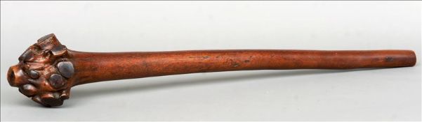 A 19th/20th century Fijian ironwood dromudromu war club Of typical form with rootstock. 95 cms long.