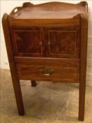 An early 19th century mahogany tray top commode (converted) The three quarter galleried top with