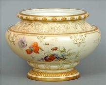 A Royal Worcester blush ivory jardiniere The gilt heightened rim above a band of scrolling mask