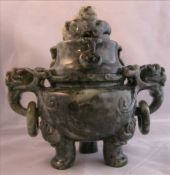 A Chinese variegated spinach jade green censor and cover Carved with dragon masks, standing on paw