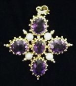 A 9 ct gold Deakin & Francis amethyst and pearl set cruciform pendant 5.5 cms high. Some scratching,