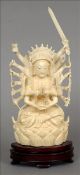 A late 19th/early 20th century carved ivory figure Formed as a multi-armed deity seated in the lotus