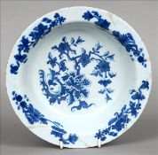 An 18th century Delft bowl, possibly Irish Decorated in underglaze blue with flowering sprays. 22.