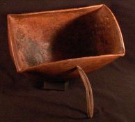 An African tribal hardwood scoop The aperture rectangular, the bowl rounded. 23.5 cms wide.