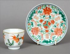 A Chinese porcelain saucer and a Chinese porcelain octagonal tea bowl The former decorated with