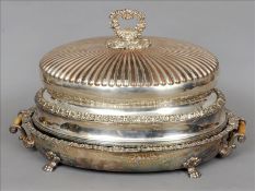 An Old Sheffield plate meat dish and cover The half gadrooned dome with applied scroll cast handle