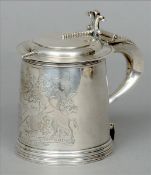 A Victorian silver lidded tankard, hallmarked London 1894, maker’s mark of WBJ The domed top with