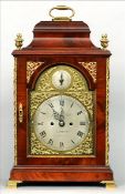 A George III mahogany cased bracket clock by George Ellicote, London The signed arched brass dial