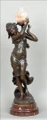 A late 19th century Art Nouveau bronze patinated spelter figural lamp Formed as a scantily clad