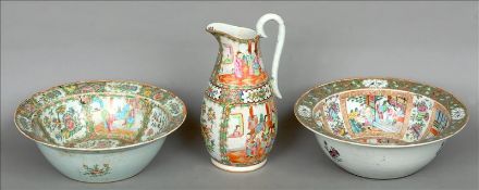Two 19th century Cantonese famille rose bowls and a jug Each typically decorated with figural and