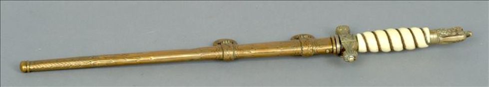 A World War II Nazi Naval dress dagger The eagle finial mounted handle above the engraved blade