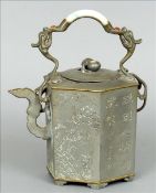 A Chinese pewter teapot The jade mounted dragon form handle above the removable cabochon set lid,