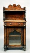 A 19th century faux rosewood painted chiffonier The three quarter galleried top supported by