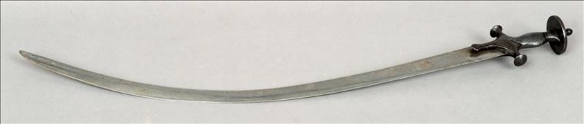 An 18th century Indo-Persian Tulwar The silvered pommel headed handle above the curved blade. 85 cms