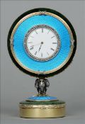 A 19th century Russian diamond mounted, enamel, jade and silver clock The circular dial with Roman