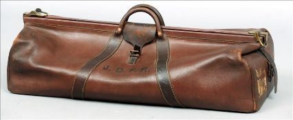 A 19th century leather cricket bag With brass corners and twin handles above the initialled main