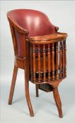 A 19th century Scottish mahogany child’s chair The leather upholstered seat above a curved tray