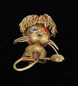 An 18 ct gold diamond and sapphire set brooch Formed as a lion in the style of Van Cleef & Arpels,