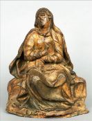 An 18th century carved wooden model of a lady, possibly the Virgin Mary With traces of polychrome