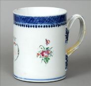 An 18th century Chinese Export porcelain mug Decorated with an initialled cartouche and floral