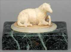 A 19th century alabaster model of a sheep Modelled naturalistically on a stepped base and a