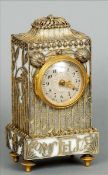 A 19th century Continental marble mantel clock The white marble case with allover unmarked silver