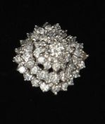 An 18 ct white gold diamond cluster ring Set with approximately 3.5 carats of diamonds. Some general