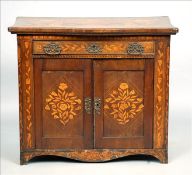A 19th century Dutch marquetry inlaid mahogany side cabinet The inlaid serpentine top above a frieze