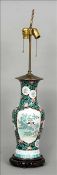 A 19th century Chinese porcelain vase The main body with scrolling floral decoration and various